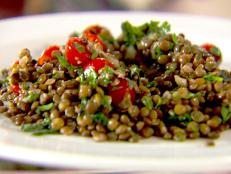 Cooking Channel serves up this Herbed Lentils with Spinach and Tomatoes recipe  plus many other recipes at CookingChannelTV.com