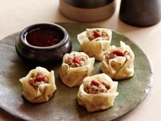 Cooking Channel serves up this Steamed Pork and Mushroom "Siu Mai" Dumplings recipe from Ching-He Huang plus many other recipes at CookingChannelTV.com