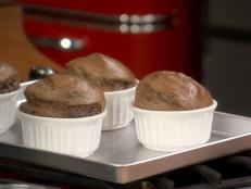 Cooking Channel serves up this Dark Chocolate Souffle with Smoked Salt and a Sweet Mint and Almond Pesto recipe from Nadia G. plus many other recipes at CookingChannelTV.com