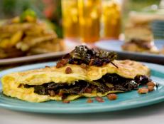 Cooking Channel serves up this Sauteed Collard Green Omelet recipe from Bobby Flay plus many other recipes at CookingChannelTV.com