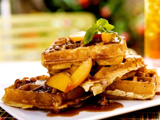 Sour Cream Waffles with Fresh Peaches and Toasted Pecan Praline Sauce