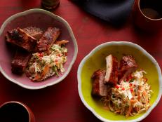 Cooking Channel serves up this Spicy Soy Ribs with Sweet and Sour Slaw recipe from Ching-He Huang plus many other recipes at CookingChannelTV.com