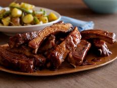 Cooking Channel serves up this 'Barbecued' Baby Back Ribs recipe  plus many other recipes at CookingChannelTV.com