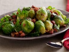 Cooking Channel serves up this Brussels Sprouts with Chestnuts, Pancetta and Parsley recipe from Nigella Lawson plus many other recipes at CookingChannelTV.com