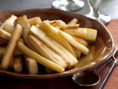 Cooking Channel serves up this Maple-Roast Parsnips recipe from Nigella Lawson plus many other recipes at CookingChannelTV.com