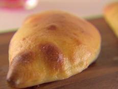 Cooking Channel serves up this Ricotta and Chocolate-Hazelnut Calzones recipe from Giada De Laurentiis plus many other recipes at CookingChannelTV.com