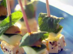 Cooking Channel serves up this Marinated Feta and Olive Skewers recipe from Ellie Krieger plus many other recipes at CookingChannelTV.com