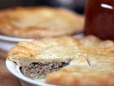 Cooking Channel serves up this Tourtiere (aka Meat Pie) recipe from Chuck Hughes plus many other recipes at CookingChannelTV.com