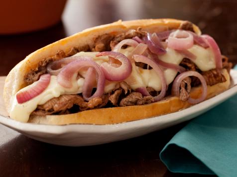 Philly Cheesesteaks with Melted Fontina and Sauteed Red Onions