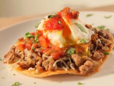 Cooking Channel serves up this Sausage and Egg Tostadas recipe  plus many other recipes at CookingChannelTV.com