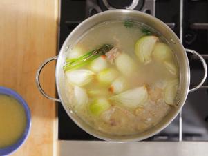 Simmer Vegetables and Stock Skimming Occasionally