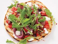 Cooking Channel serves up this Grilled Pita Pizzas recipe  plus many other recipes at CookingChannelTV.com