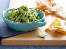 Cooking Channel serves up this Spicy Guacamole recipe from Bobby Flay plus many other recipes at CookingChannelTV.com