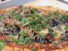 Cooking Channel serves up this Mushroom, Onion and Basil Pizza recipe from Ellie Krieger plus many other recipes at CookingChannelTV.com