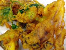 Cooking Channel serves up this Curried Cauliflower Fritters recipe from Jamie Oliver plus many other recipes at CookingChannelTV.com