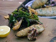 Cooking Channel serves up this Roasted Concertina Squid with Grilled Leeks and a Warm Chorizo Dressing recipe from Jamie Oliver plus many other recipes at CookingChannelTV.com