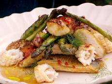 Cooking Channel serves up this Pan-Cooked Asparagus and Mixed Fish recipe from Jamie Oliver plus many other recipes at CookingChannelTV.com