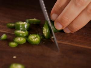 Cut Chile Peppers in Small Rounds Avoiding Eyes