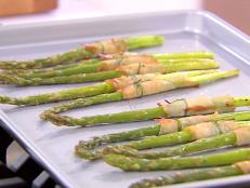 Cooking Channel serves up this Smoked Turkey Wrapped Asparagus recipe from Ellie Krieger plus many other recipes at CookingChannelTV.com