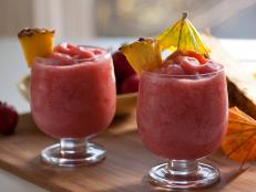 Cooking Channel serves up this Strawberry Pina Colada recipe from Bobby Flay plus many other recipes at CookingChannelTV.com