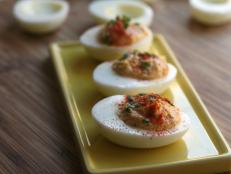 Cooking Channel serves up this Curried Deviled Eggs recipe from Kelsey Nixon plus many other recipes at CookingChannelTV.com