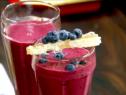 The resurector chucks hangover shake topped with blueberries and a slice of honeycomb.