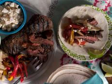 Cooking Channel serves up this Pomegranate Glazed Skirt Steak Fajitas recipe from Kelsey Nixon plus many other recipes at CookingChannelTV.com