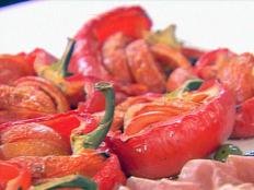 Cooking Channel serves up this Tomato Stuffed Peppers recipe from Ellie Krieger plus many other recipes at CookingChannelTV.com