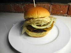 Cooking Channel serves up this Double Onion Ancho Chile Rubbed Cheddar Cheese Burger with Mustard Sauce recipe  plus many other recipes at CookingChannelTV.com