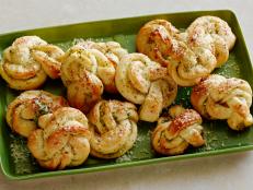 Cooking Channel serves up this Buttery Garlic Herb Knots recipe from Kelsey Nixon plus many other recipes at CookingChannelTV.com