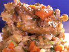 Cooking Channel serves up this Roasted Tomato and White Bean Stewed Chicken with Apricot Pine Nut Cousous recipe  plus many other recipes at CookingChannelTV.com