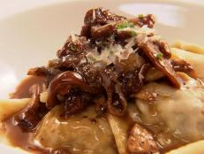 Cooking Channel serves up this Short Rib Ravioli and Creamy Mushroom Sauce recipe from Chuck Hughes plus many other recipes at CookingChannelTV.com