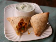 Cooking Channel serves up this Sweet Potato Samosas with Ginger-Cucumber Raita recipe  plus many other recipes at CookingChannelTV.com