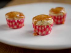 Cooking Channel serves up this Apple-Vanilla Mini Muffins with Cider Glaze recipe  plus many other recipes at CookingChannelTV.com