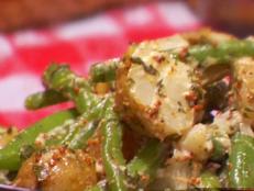 Cooking Channel serves up this Warm Dijon Potato Salad with Green Beans recipe from Dave Lieberman plus many other recipes at CookingChannelTV.com