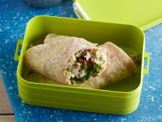 Cooking Channel serves up this Mediterranean Tuna Wrap recipe from Ellie Krieger plus many other recipes at CookingChannelTV.com