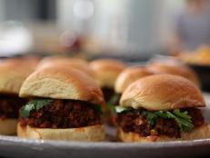 Cooking Channel serves up this Chipotle Porky Joe Sliders recipe from Michael Symon plus many other recipes at CookingChannelTV.com
