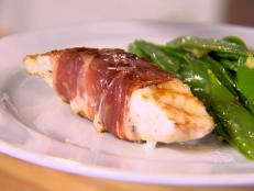Cooking Channel serves up this Prosciutto Wrapped Cod recipe  plus many other recipes at CookingChannelTV.com