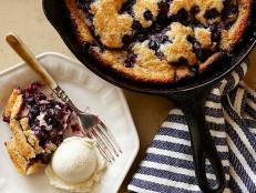 Cooking Channel serves up this Cast-Iron Blueberry Cobbler recipe  plus many other recipes at CookingChannelTV.com