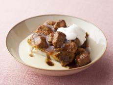 Cooking Channel serves up this Pumpkin Bread Pudding with Spicy Caramel Apple Sauce and Vanilla Bean Creme Anglaise recipe from Bobby Flay plus many other recipes at CookingChannelTV.com