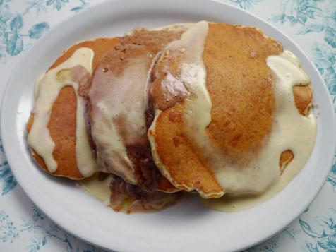 Southport Grocery and Cafe's Bread Pudding Pancakes with Vanilla Custard Sauce and Cinnamon Sugar Butter