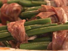 Cooking Channel serves up this Beans Wrapped in Prosciutto recipe from Nigella Lawson plus many other recipes at CookingChannelTV.com