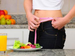 CCSP_thinkstock-measuring-waist-while-dieting_s4x3