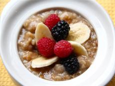 Cooking Channel serves up this Slow Cooker Irish Oatmeal with Bananas and Berries recipe from Kelsey Nixon plus many other recipes at CookingChannelTV.com
