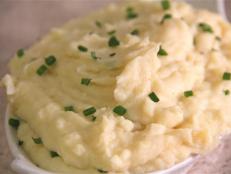 Cooking Channel serves up this Slow Cooker Garlic Mashed Potatoes recipe from Kelsey Nixon plus many other recipes at CookingChannelTV.com