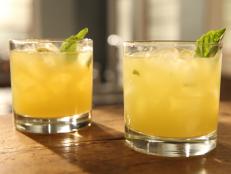 Cooking Channel serves up this Meyer Lemon and Basil Fizz recipe from Michael Symon plus many other recipes at CookingChannelTV.com