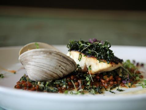 Plancha Grilled Striped Bass with Creamed Kale, Blanched Garlic Puree and Wheat Berries with Tomato Puree