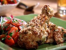 Cooking Channel serves up this Oven-Fried Chicken Milanese with Tomato-Onion Salad recipe from Aida Mollenkamp plus many other recipes at CookingChannelTV.com