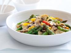 Cooking Channel serves up this Asparagus, Artichoke, and Mushroom Saute with Tarragon Vinaigrette recipe  plus many other recipes at CookingChannelTV.com