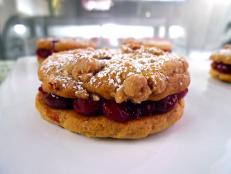 Cooking Channel serves up this Cherry Almond Cobbler Sandwich Cookies recipe  plus many other recipes at CookingChannelTV.com